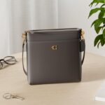 1746671397 coach crossgrain leather kitt messenger bag.jpg