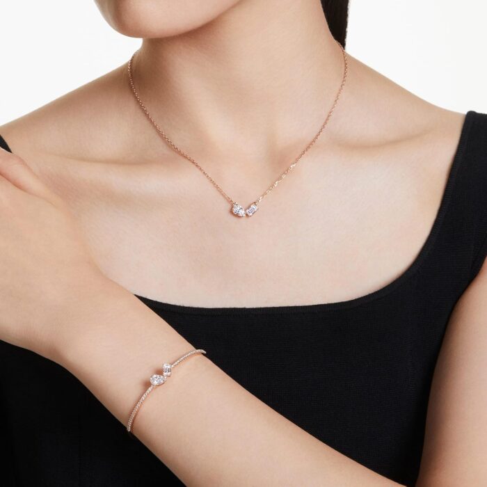 1746730253 swarovski mesmera necklace and bracelet set clear mixed cut stones in a rose gold tone finished setting part of the mesmera collection.jpg