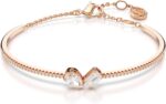 1746730258 swarovski mesmera necklace and bracelet set clear mixed cut stones in a rose gold tone finished setting part of the mesmera collection.jpg
