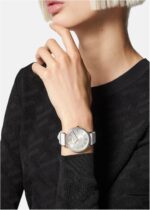1746802327 versace v eternal collection luxury womens watch timepieces with a white strap featuring a stainless steel case and a silver dial.jpg