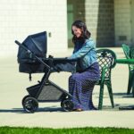 1746836771 evenflo pivot modular travel system with litemax infant car seat with anti rebound bar desert tan.jpg