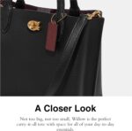 1746984800 coach polished pebble leather willow tote 24 black.jpg