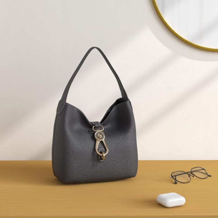 1747010755 dooney bourke womens small logo lock sac shoulder bag in pebble grain leather with signature logo lock closure.jpg