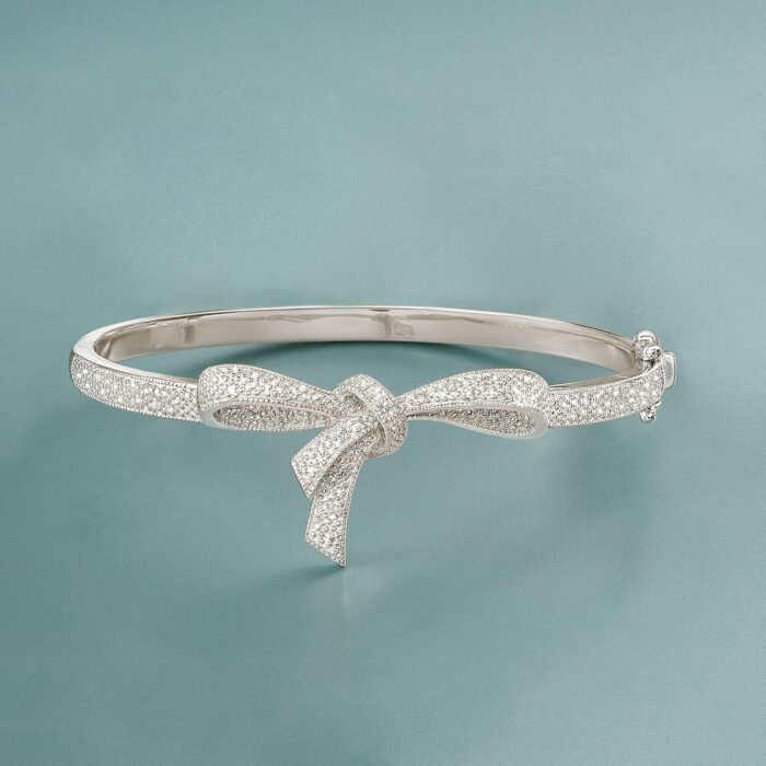 1747013104 ross simons 0.15 ct. t.w. diamond bow bangle bracelet in sterling silver. 7 inches.jpg