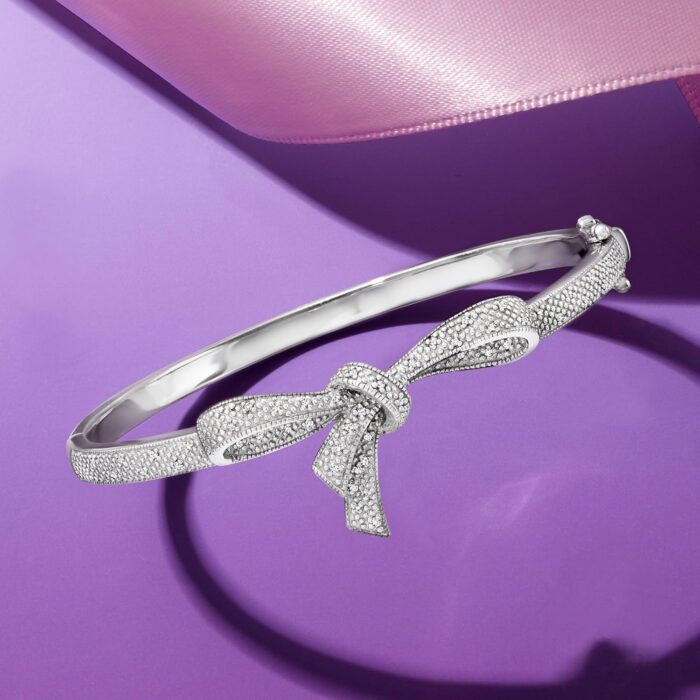 1747013109 ross simons 0.15 ct. t.w. diamond bow bangle bracelet in sterling silver. 7 inches.jpg