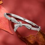 1747013111 ross simons 0.15 ct. t.w. diamond bow bangle bracelet in sterling silver. 7 inches.jpg