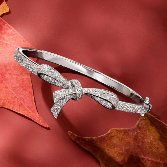 1747013111 ross simons 0.15 ct. t.w. diamond bow bangle bracelet in sterling silver. 7 inches.jpg