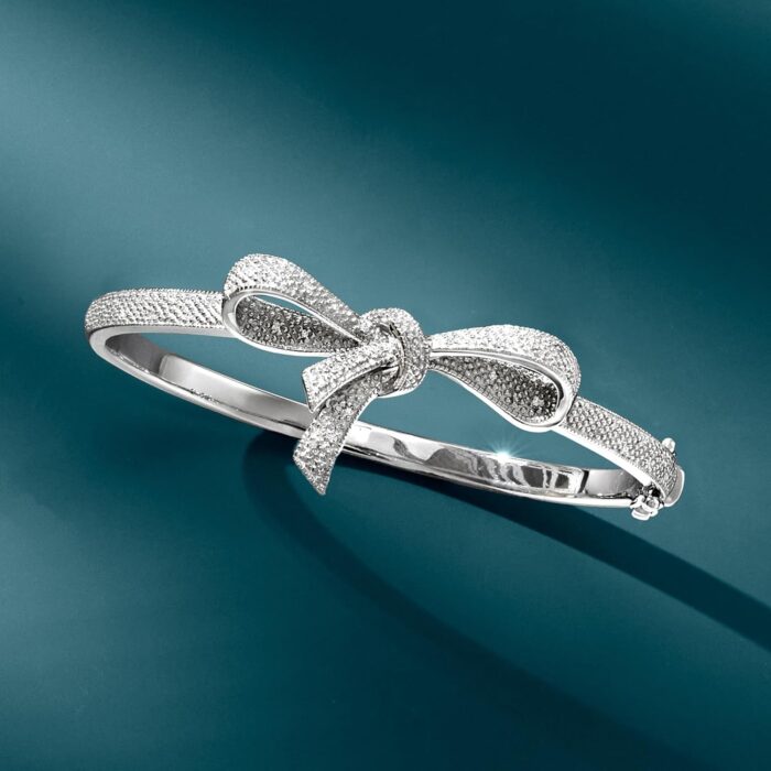 1747013113 ross simons 0.15 ct. t.w. diamond bow bangle bracelet in sterling silver. 7 inches.jpg