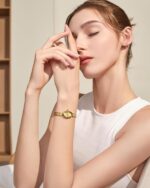 1747022169 golden bean series womens watch oval case adjustable stainless steel bracelet wrapped by stylish gift box elegant present gold watch for women.jpg