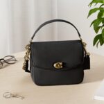 1747090304 coach polished pebbled leather cassie crossbody 19.jpg