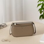1747119729 kate spade new york bleecker saffiano leather small crossbody bag.jpg