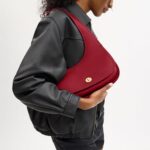 1747130949 coach cashin carry crescent bag.jpg