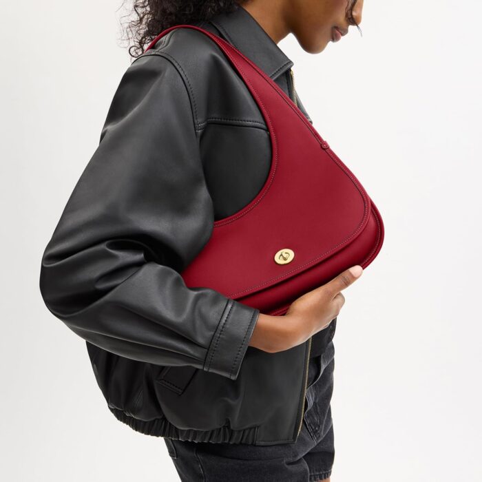1747130949 coach cashin carry crescent bag.jpg