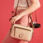 1747142117 dooney bourke womens camera zip crossbody in pebble grain leather small handbag with adjustable shoulder strap.jpg