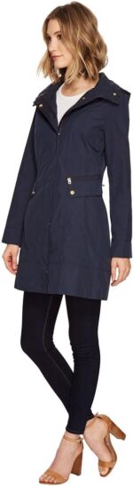 1747204757 cole haan womens packable hooded rain jacket with bow.jpg