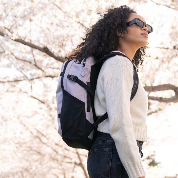 1747206823 wandrd nimbus 18l lightweight travel backpack for men and women weather resistant everyday bag with padded shoulder straps laptop bag and traveling bag for office uyuni purple.jpg