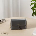 1747282700 kate spade new york knott pebbled leather flap crossbody.jpg