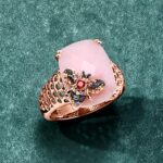 1747296580 ross simons pink opal and .10 ct. t.w. multicolored sapphire bumblebee ring with single garnet in 18kt rose gold over sterling.jpg