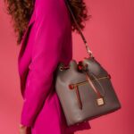 1747312717 dooney bourke womens drawstring in pebble grain leather medium sized handbag with drawstring closure red.jpg