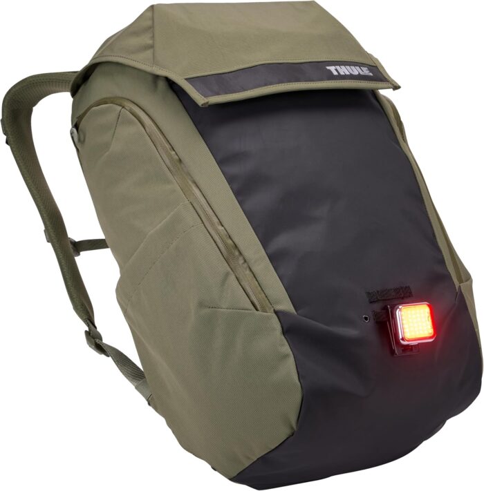 1747316920 thule paramount bike commuter backpack 28l capacity adjustable fit 16 padded laptop sleeve and 11 tablet pocket helmet attachment accessible side phone pocket taillight loop.jpg