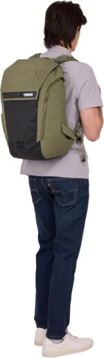 1747316923 thule paramount bike commuter backpack 28l capacity adjustable fit 16 padded laptop sleeve and 11 tablet pocket helmet attachment accessible side phone pocket taillight loop.jpg