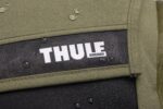 1747316926 thule paramount bike commuter backpack 28l capacity adjustable fit 16 padded laptop sleeve and 11 tablet pocket helmet attachment accessible side phone pocket taillight loop.jpg