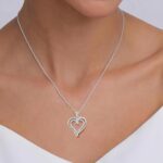 1747322211 jewelili double heart necklace pendant with natural white round diamonds 12 cttw in sterling silver or yellow gold over sterling silver 18 inch cable chain.jpg