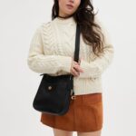 1747323690 coach polished pebble leather chaise crossbody black one size.jpg