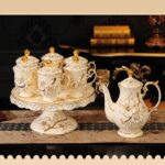 1747324100 high end ceramic tea set with rotatable tray emboss decoration coffee cup set of 6 with teapot.jpg