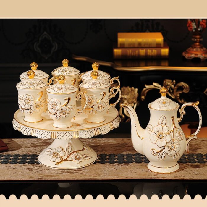 1747324100 high end ceramic tea set with rotatable tray emboss decoration coffee cup set of 6 with teapot.jpg