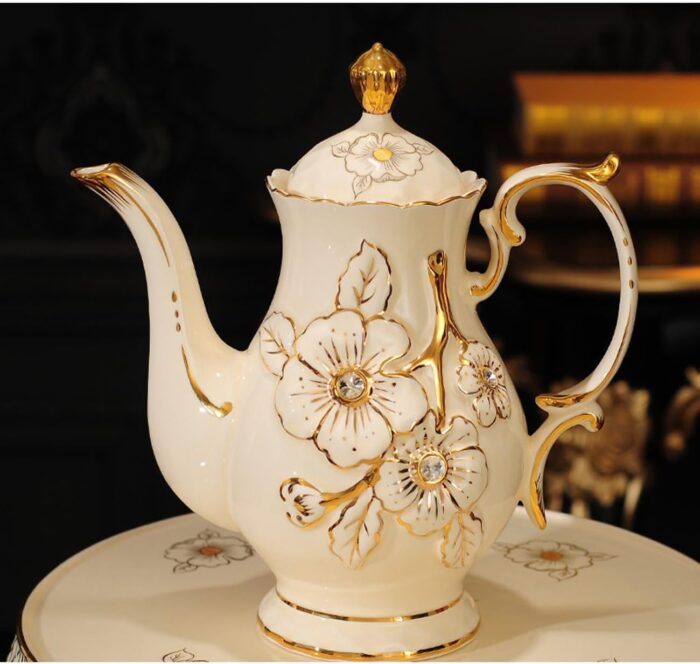 1747324103 high end ceramic tea set with rotatable tray emboss decoration coffee cup set of 6 with teapot.jpg