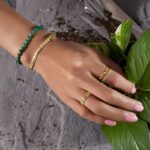 1747333227 canaria 10kt yellow gold panther link ring.jpg