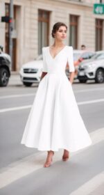 1747404618 a line elegant mother of the bride dress v neck tea length half sleeve wedding guest dress 2025.jpg