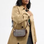 1747482771 coach swinger bag in signature jacquard b4oak maple.jpg