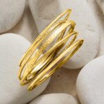 1747595539 ross simons 18kt gold over sterling jewelry set 5 textured bangle bracelets.jpg