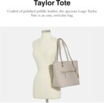 1747596655 coach womens polished pebble leather taylor tote.jpg