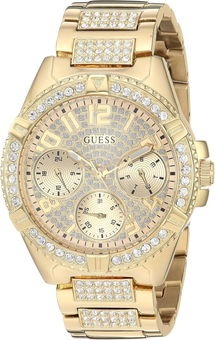 Guess gold tone stainless steel crystal watch with day date 24 hour militaryintl time. color gold tone model u1156l2.jpg