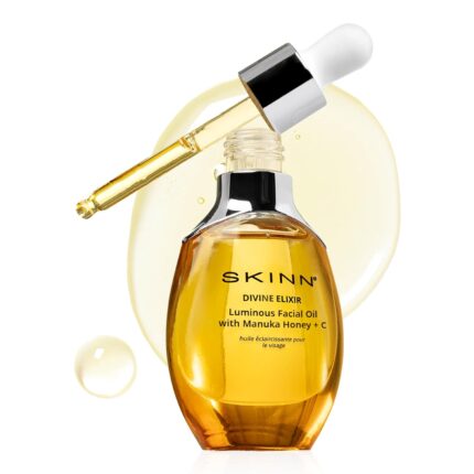 Skinn luminous facial oil face oil to visibly brighten firm and hydrate hydrating oil for anti aging and dry skin to reduce fine lines and wrinkles vitamin c and manuka honey.jpg