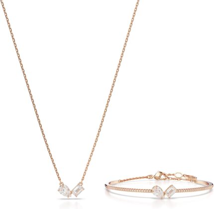 Swarovski mesmera necklace and bracelet set clear mixed cut stones in a rose gold tone finished setting part of the mesmera collection.jpg