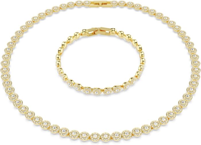 Swarovski una angelic set round cut clear gold tone finish.jpg