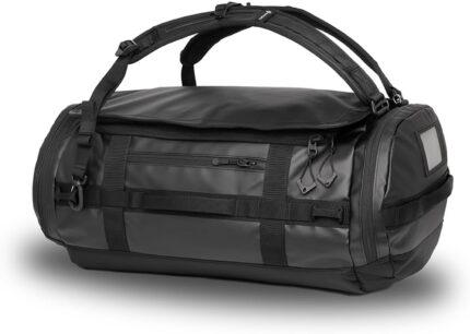 Wandrd carryall 30l black perfect travel essentials duffel bag versatile for traveling ideal weekender everyday travel bag.jpg
